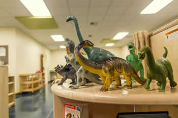toy dinosaurs stacked together