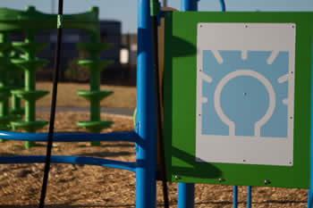 Closeup of LES logo on outdoor playground